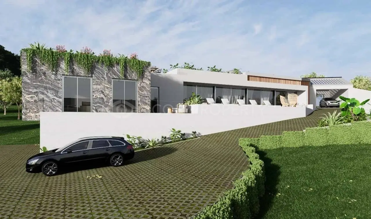 Terrain avec projet approuvé pour une villa contemporaine de 4 chambres avec vue sur la mer à Loulé